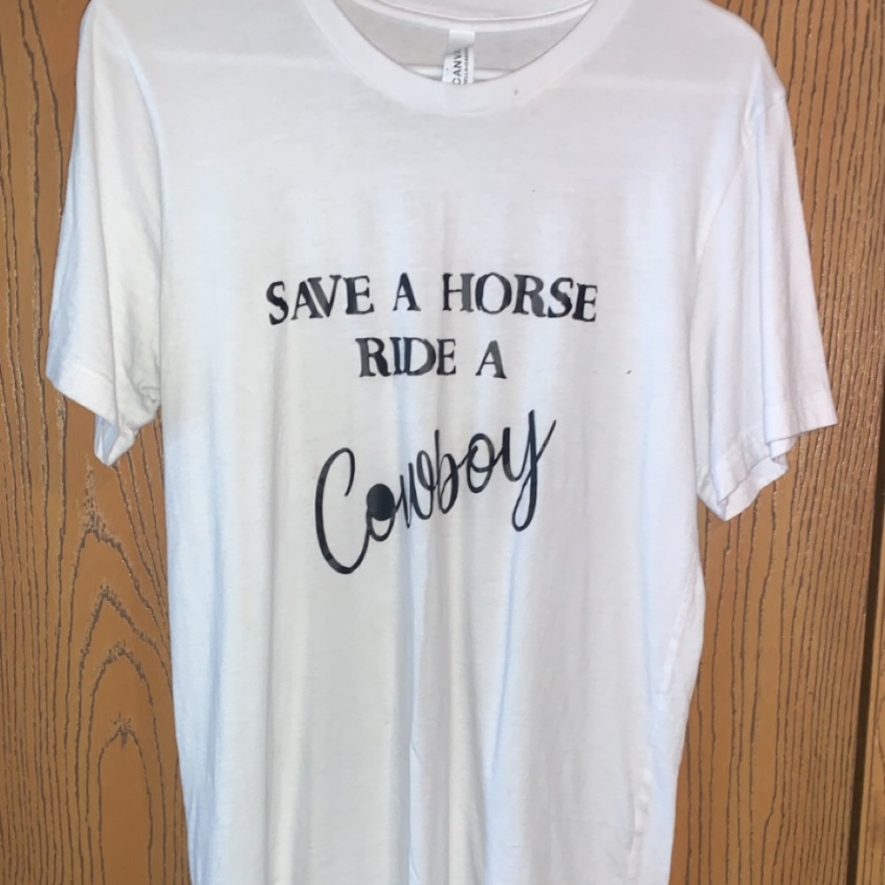 Save a horse ride a cowboy. Size Large tee